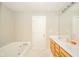 Bathroom showcasing a tub and double sink vanity at 1139 Maple Stream Dr, Indianapolis, IN 46217