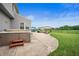 A backyard with a hot tub, patio, and a view of the neighborhood at 1143 Hampton Dr, Greenwood, IN 46143