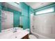 Modern bathroom featuring a single sink vanity, shower, and a window at 1143 Hampton Dr, Greenwood, IN 46143