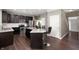 Stylish kitchen with granite countertops, stainless steel appliances and island seating at 1143 Hampton Dr, Greenwood, IN 46143