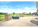 Large outdoor patio with a custom stone seating area and view of the backyard at 1143 Hampton Dr, Greenwood, IN 46143