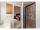 The bathroom features a tiled glass shower, an oak cabinet, and access to the bedroom at 1159 Oak Leaf Rd, Franklin, IN 46131