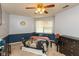 Comfortable bedroom featuring a queen bed, dark wood furniture, and neutral carpet at 1159 Oak Leaf Rd, Franklin, IN 46131