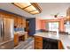 Bright eat-in kitchen featuring oak cabinets and counter and desk space at 1159 Oak Leaf Rd, Franklin, IN 46131