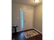 Bright foyer with hardwood flooring and decorative rug near the front door at 12328 Quarry Face Ct, Fishers, IN 46037