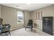 Comfortable bedroom with neutral walls, large window, and a secure safe at 126 Winding Brook Way, Pendleton, IN 46064
