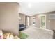 Functional bonus room with comfortable seating, multiple entryways, and ample space for various activities at 126 Winding Brook Way, Pendleton, IN 46064