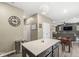 Open floorplan shot of a kitchen with center island that transitions into a living room area at 126 Winding Brook Way, Pendleton, IN 46064