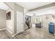 Spacious foyer leading into a living room featuring hardwood floors, a ceiling fan, and comfortable furniture at 126 Winding Brook Way, Pendleton, IN 46064