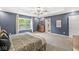 Well-lit bedroom with a large window and neutral walls, creates a serene and inviting atmosphere at 126 Winding Brook Way, Pendleton, IN 46064