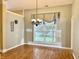 Breakfast area featuring a chandelier and window with lots of natural light at 12656 Cerromar Ct, Carmel, IN 46033