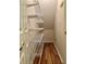 Well-organized closet featuring multiple wire shelves and a hanging rod for optimal storage solutions at 12656 Cerromar Ct, Carmel, IN 46033