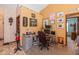 Functional home office with a desk, chair, shelving, and lots of wall decor at 1547 Millridge Dr, Greenwood, IN 46143