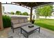 A covered patio with comfortable seating area perfect for outdoor entertaining at 1744 Salina Dr, Avon, IN 46123