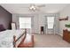 Large bedroom with generous natural light, neutral tones, and ample floor space at 1744 Salina Dr, Avon, IN 46123