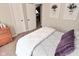 Bedroom featuring decor, open closet doors, and soft, neutral color scheme at 1744 Salina Dr, Avon, IN 46123