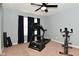 Home gym featuring a ceiling fan, exercise equipment and natural lighting at 1744 Salina Dr, Avon, IN 46123
