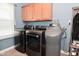 Laundry room with stainless washer, dryer and wood style floors at 1744 Salina Dr, Avon, IN 46123