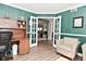 Inviting living room with hardwood floors, french doors and neutral decor at 1744 Salina Dr, Avon, IN 46123