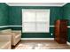 Bright living room boasts wood floors, natural light, and stylish furnishings at 1744 Salina Dr, Avon, IN 46123