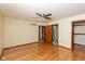 Spacious bedroom with hardwood floors and an attached bathroom and walk-in closet at 180 Hollowview Dr, Noblesville, IN 46060
