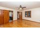 Bright bedroom with hardwood floors, natural light, and access to an ensuite bathroom at 180 Hollowview Dr, Noblesville, IN 46060