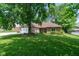 Charming brick home with a well-manicured lawn and mature tree in a desirable neighborhood at 180 Hollowview Dr, Noblesville, IN 46060
