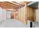 Unfinished basement with exposed framing, concrete floor, and utilities at 1826 Spruce Dr, Carmel, IN 46033