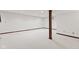 A finished basement featuring neutral carpet and a decorative beam at 1826 Spruce Dr, Carmel, IN 46033