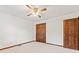 Bedroom with ceiling fan, and closet at 1826 Spruce Dr, Carmel, IN 46033
