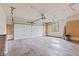 A spacious garage with ladder, and automatic door opener at 1826 Spruce Dr, Carmel, IN 46033