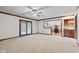 Living room view with access to the kitchen and sliding doors to backyard at 1826 Spruce Dr, Carmel, IN 46033
