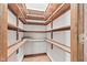 Pantry featuring ample shelving for organized storage with wood-look floors at 1826 Spruce Dr, Carmel, IN 46033