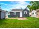 Spacious backyard featuring a brick patio and a well-maintained lawn, ideal for relaxation at 188 Maple Ln, Franklin, IN 46131