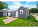 Green backyard with a brick patio and well-kept lawn, offering a private outdoor space at 188 Maple Ln, Franklin, IN 46131