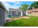 Well-maintained backyard with a brick patio and lush green lawn, perfect for outdoor activities at 188 Maple Ln, Franklin, IN 46131