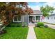 Charming home with a welcoming front porch and well-maintained landscaped lawn at 188 Maple Ln, Franklin, IN 46131