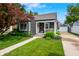 Charming home with a welcoming front porch, landscaped lawn, and detached garage at 188 Maple Ln, Franklin, IN 46131