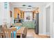 Bright kitchen with natural wood and light green cabinets and stainless steel appliances at 188 Maple Ln, Franklin, IN 46131