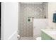 Elegant shower with decorative tile, a niche for storage, and a modern showerhead at 188 Maple Ln, Franklin, IN 46131