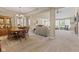 Spacious dining and living areas with large windows allowing natural light to flow through at 18991 Round Lake Rd, Noblesville, IN 46060