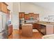 Well-equipped kitchen boasts stainless steel appliances, central island, and plenty of storage at 18991 Round Lake Rd, Noblesville, IN 46060