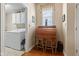 Laundry room featuring a desk, cabinets, and a window at 18991 Round Lake Rd, Noblesville, IN 46060