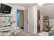 Bedroom with a vanity area, showing access to other rooms and natural light, creating a bright and airy space at 20417 State Road 37 N, Noblesville, IN 46060