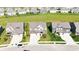 Aerial view of a neighborhood highlighting homes with manicured lawns and tree-lined streets at 2358 S Stonehill Way, New Palestine, IN 46163