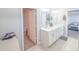 Bright bathroom features a double vanity with ample storage and modern finishes at 2358 S Stonehill Way, New Palestine, IN 46163