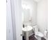 Powder room featuring a pedestal sink, toilet with a bidet, offering convenience for guests at 2358 S Stonehill Way, New Palestine, IN 46163