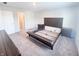 This bedroom features neutral decor and carpeted floors at 2358 S Stonehill Way, New Palestine, IN 46163