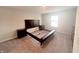 This bedroom features neutral decor and carpeted floors at 2358 S Stonehill Way, New Palestine, IN 46163