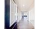 Welcoming entryway featuring stylish flooring, leading to a bright and open living space for modern comfort at 2358 S Stonehill Way, New Palestine, IN 46163